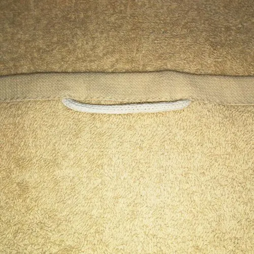 Beige frottir törölköző akasztóval